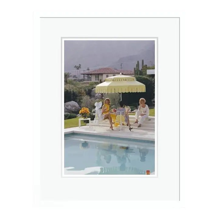 Nelda and Friends 1970 by Slim Aarons Framed C Print